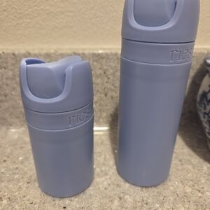 2 Ries Light Blue Travel Bottles